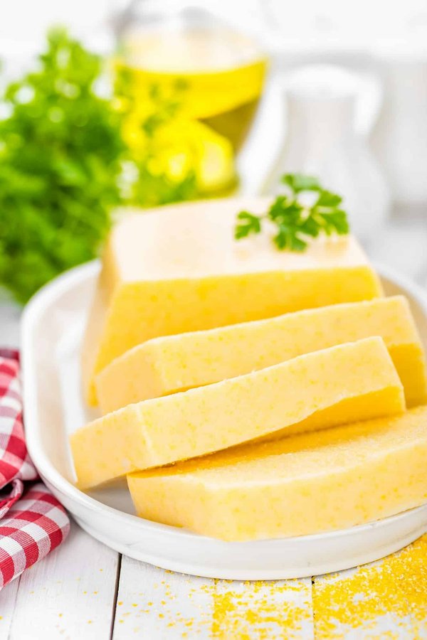 Welche Schritte sind nötig, um eine cremige Polenta als Beilage zu perfektionieren?